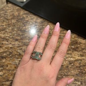 Chanel ring missing one stone emerald